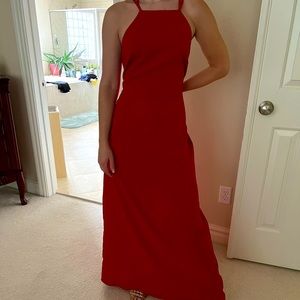 Stunning prom, formal, or ring dance dress. Lightly used, size medium, red.